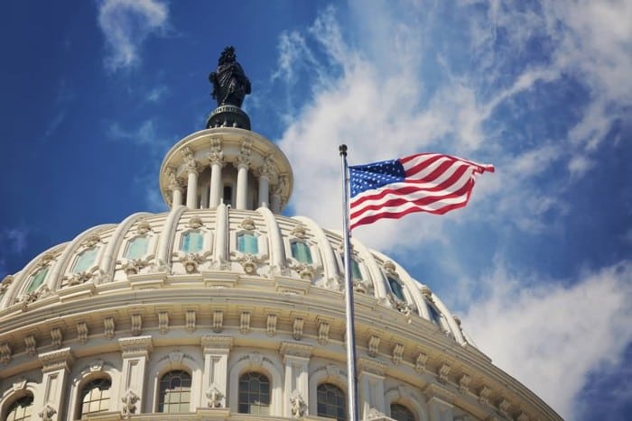 United-States-Capitol-Dome-And-American-Flag-Picture-2616571778