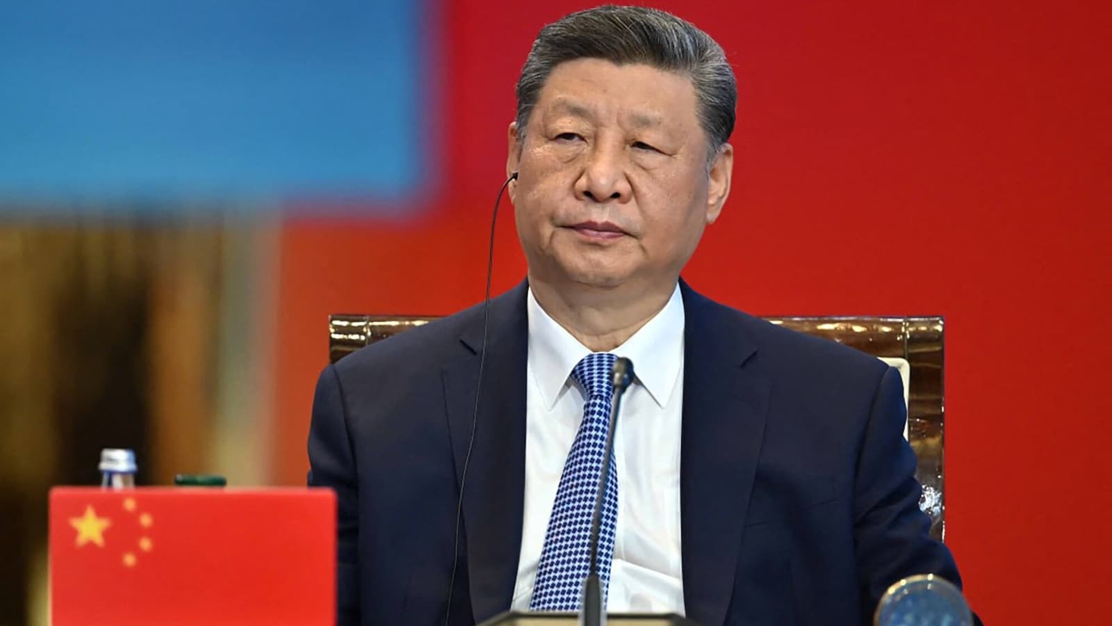 Xi